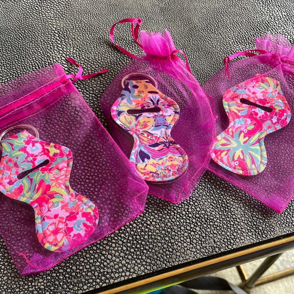 3 adorable key chains that wil hold a small lipstick or lip balm
